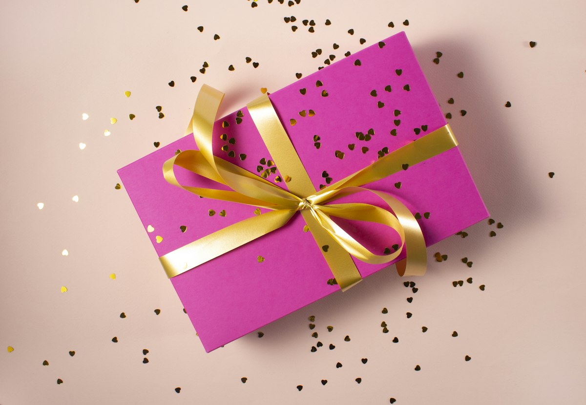 A child unwrapping a delightful toy gift